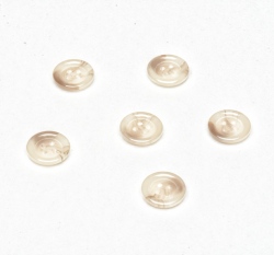 Knoflík kulatý, lesklý, smetanový žíhaný