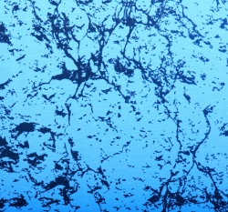 Teplákovina potisk popraskaný beton na modré