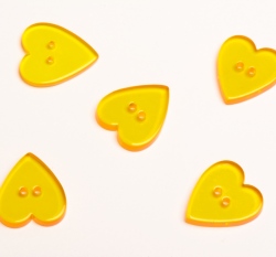 Knoflík srdíčko hladké, průhledné žluté