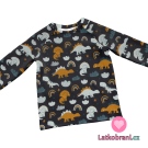 Úplet potisk dinosauři na tmavě modré 