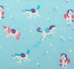 Bavlněné plátno kouzelní jednorožci na modré