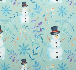 Úplet potisk sněhuláci mezi větvičkami na modré