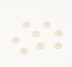 Knoflík kulatý, matný, krémový