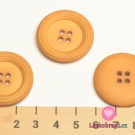 Knoflík s ozdobným okrajem hořčicový