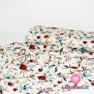 Viskózový úplet potisk barevné květy na smetanové