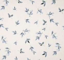 Bavlněný vaflový úplet potisk modré lístky na bílé