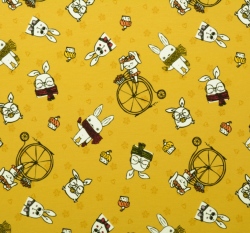 Teplákovina potisk neposední králíčci na hořčicovém podkladu