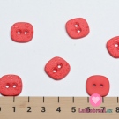 Knoflík hranatý, zaoblený, s efektem kapiček růžový tmavší