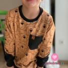 Teplákovina potisk medvídek Méďa na vínovém podkladu se vzorem rybí kosti