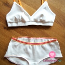 Žebrovaný jednobarevný úplet petrolejový