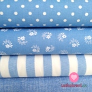 Bavlněné plátno bílé puntíky na modré 