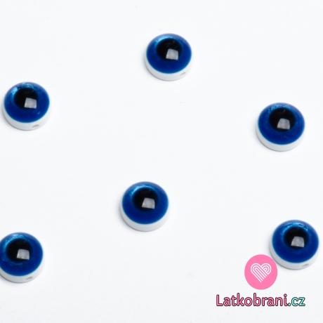 Knoflík oko modré