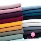 Žebrovaný jednobarevný úplet šedý