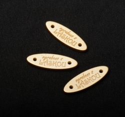 Štítek na oblečení polyesterový zlatý 