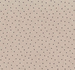 Len potisk černé puntíčky na béžovém podkladu