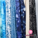 Funkční úplet "mléčné hedvábí" tyrkysovo - bílé nepravidelné proužky