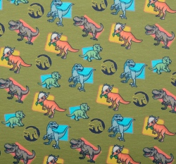 Úplet potisk dinosauři z Jurského světa na zelené