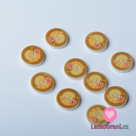 Knoflik kulatý, žlutý šnek na světle hnědé