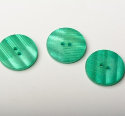 Knoflík kulatý, perleť, zelený, z poloviny vroubkatý - střední