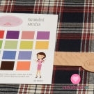 Kostýmová látka tmavě modrá kostka s červeným lemováním