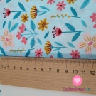 Bavlněný popelín rozkvetlé kytičky na světle tyrkysové