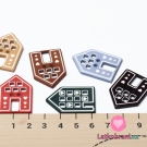 Knoflík ve tvaru domečku se srdíčky v oknech pudrový tmavší