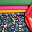 Lesní kvítí s beruškami na modré