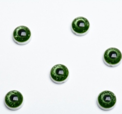 Knoflík oko zelené